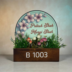 Mint Floral Wooden Planter Nameplate | Pritesh & Margi Shah — table hero (KKWN0042)