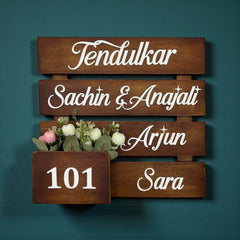 Four-Slat Wooden Planter Nameplate | Tendulkar Family 101 — installed hero (KKWN013)