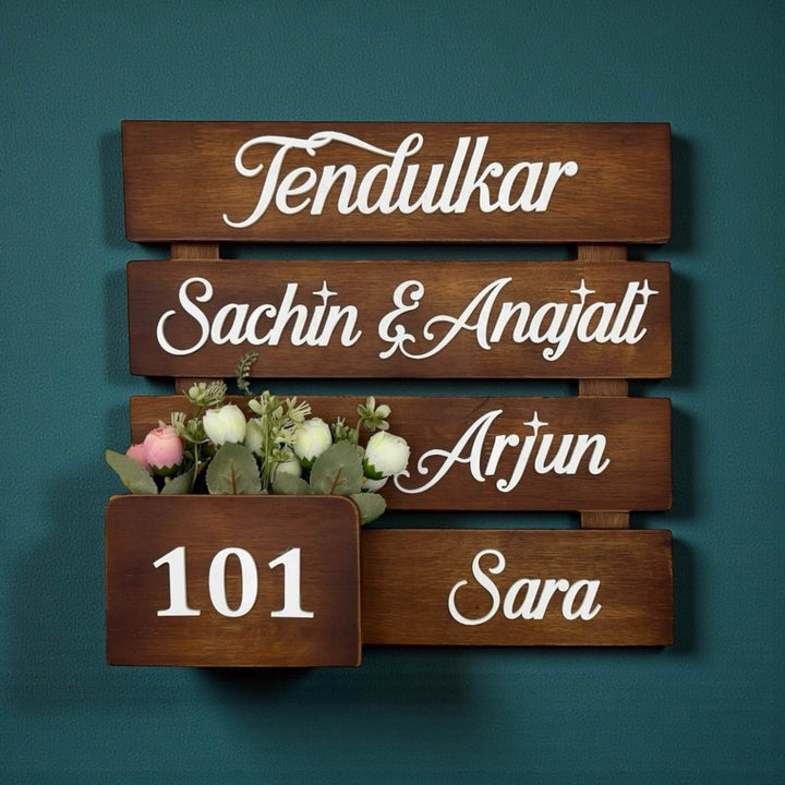 Four-Slat Wooden Planter Nameplate | Tendulkar Family 101 — installed hero (KKWN013)