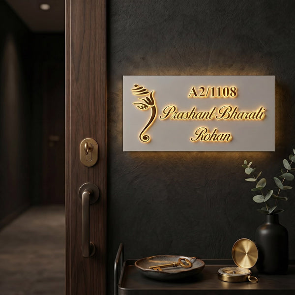 Prashant Bharati Rohan A2/1108 Ganesh LED nameplate — Supplied installed scene, warm LED on