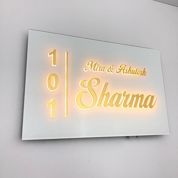 Mira & Ashutosh Sharma 101 white acrylic LED nameplate — Installed warm LED on