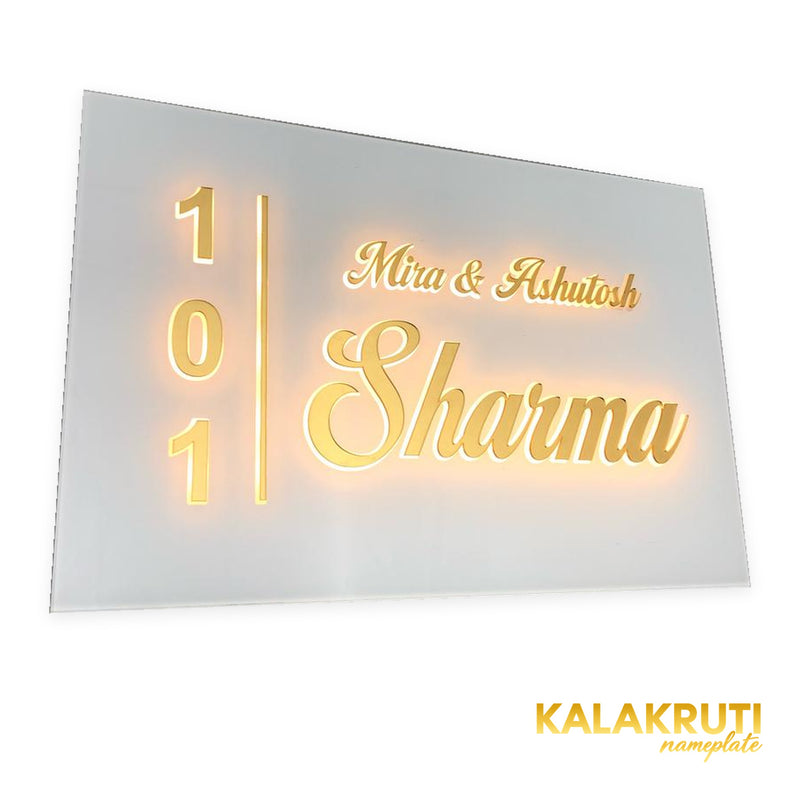 Mira & Ashutosh Sharma 101 white acrylic LED nameplate — Left angle warm LED on