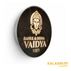 Vaidya 1001 Hanuman round LED nameplate — Left angle warm LED on