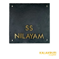 SS Nilayam nameplate, level front view on a white studio background