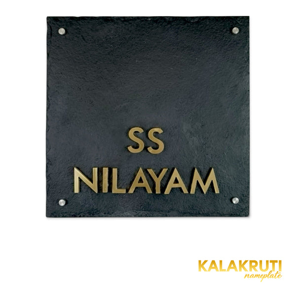 SS Nilayam nameplate, level front view on a white studio background