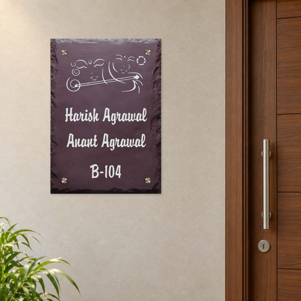 Harish and Anant Agrawal engraved brown stone nameplate shown installed beside an apartment entrance door