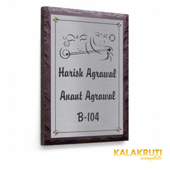 Harish and Anant Agrawal etched stainless steel and brown stone nameplate, left angle showing the steel panel fitted directly against the stone