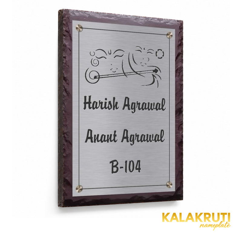 Harish and Anant Agrawal etched stainless steel and brown stone nameplate, left angle showing the steel panel fitted directly against the stone