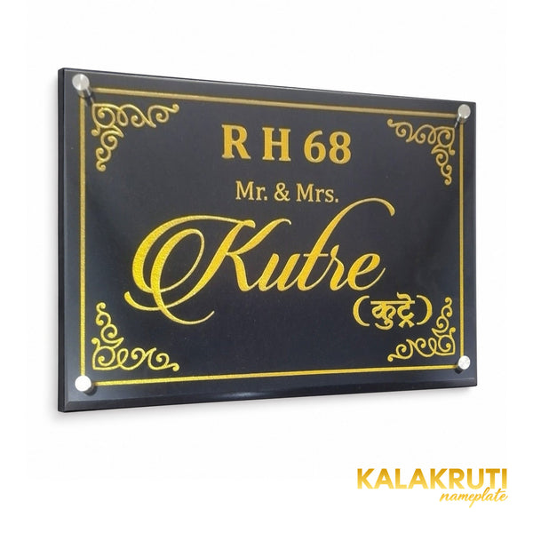 Kutre black granite engraved nameplate with gold colour fill, left oblique view showing the beveled edge and silver-tone caps