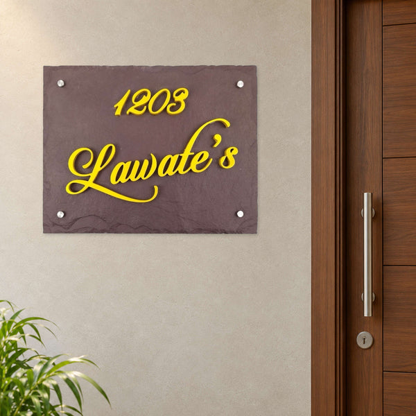 Lawate nameplate shown installed beside an indoor apartment entrance door