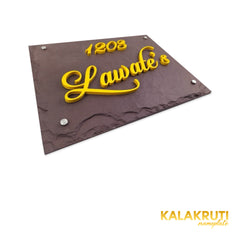 Lawate nameplate, low left tabletop angle showing the yellow acrylic depth on a white studio background