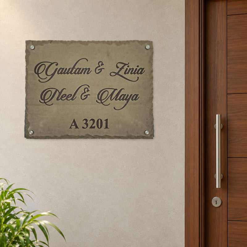 Gautam & Family nameplate shown installed beside an indoor apartment entrance door