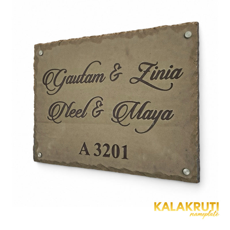 Gautam & Family sandstone engraved nameplate, right oblique view with original script, chipped rim and four silver-tone caps