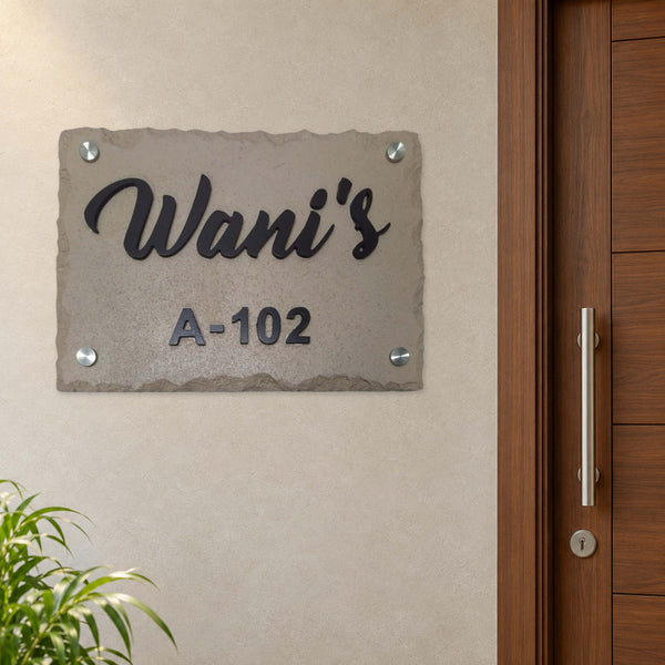 Wani nameplate shown installed beside an indoor apartment entrance door