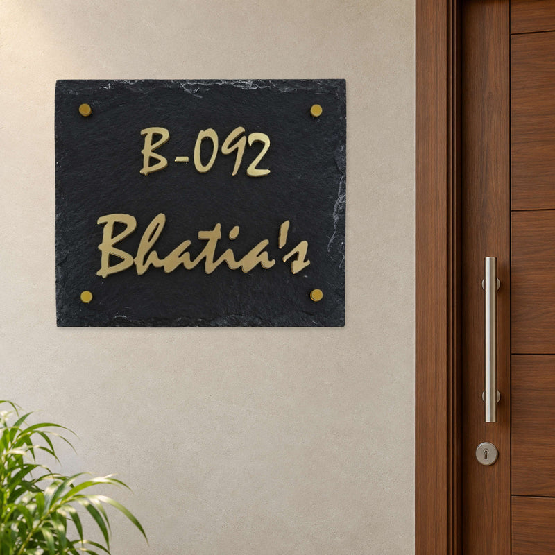 Bhatia nameplate shown installed beside an indoor apartment entrance door