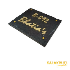 Bhatia nameplate, original low right angle showing5mm brass letters on a white studio background