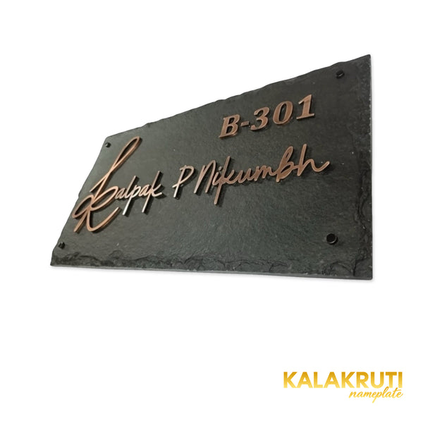 Kalpak nameplate, right oblique view on a white studio background
