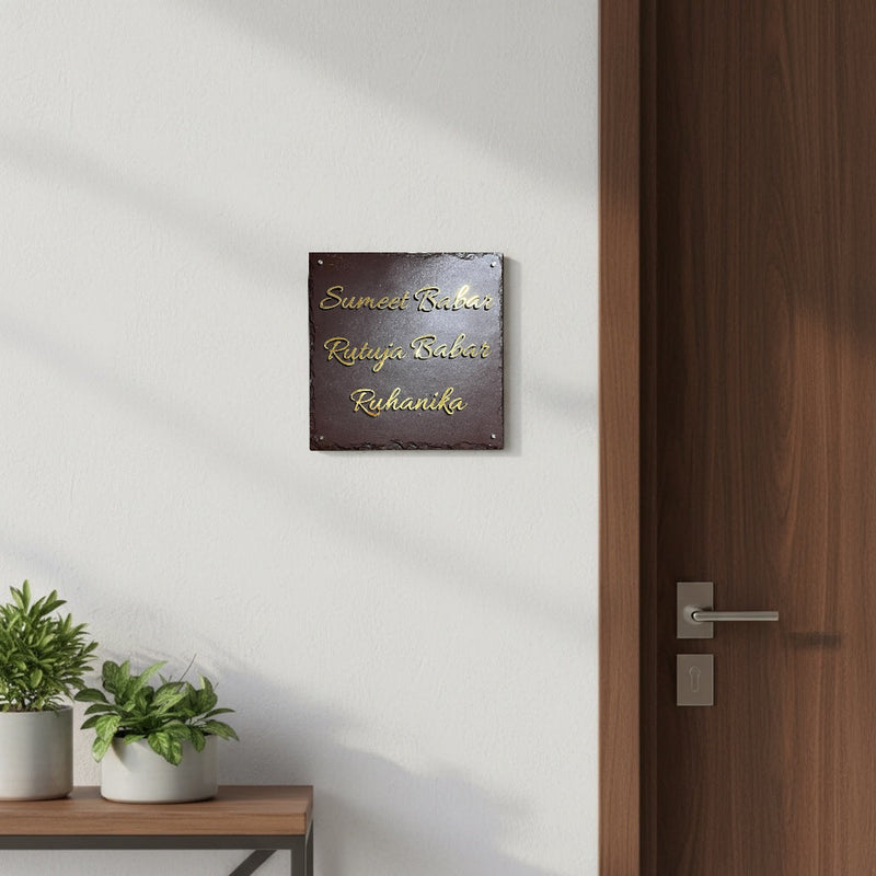 Sumeet and Rutuja Babar family nameplate in the supplied wider apartment entrance scene with a wooden door