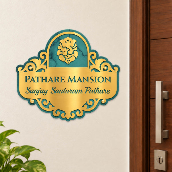 Pathare Mansion nameplate shown installed beside an indoor apartment entrance door