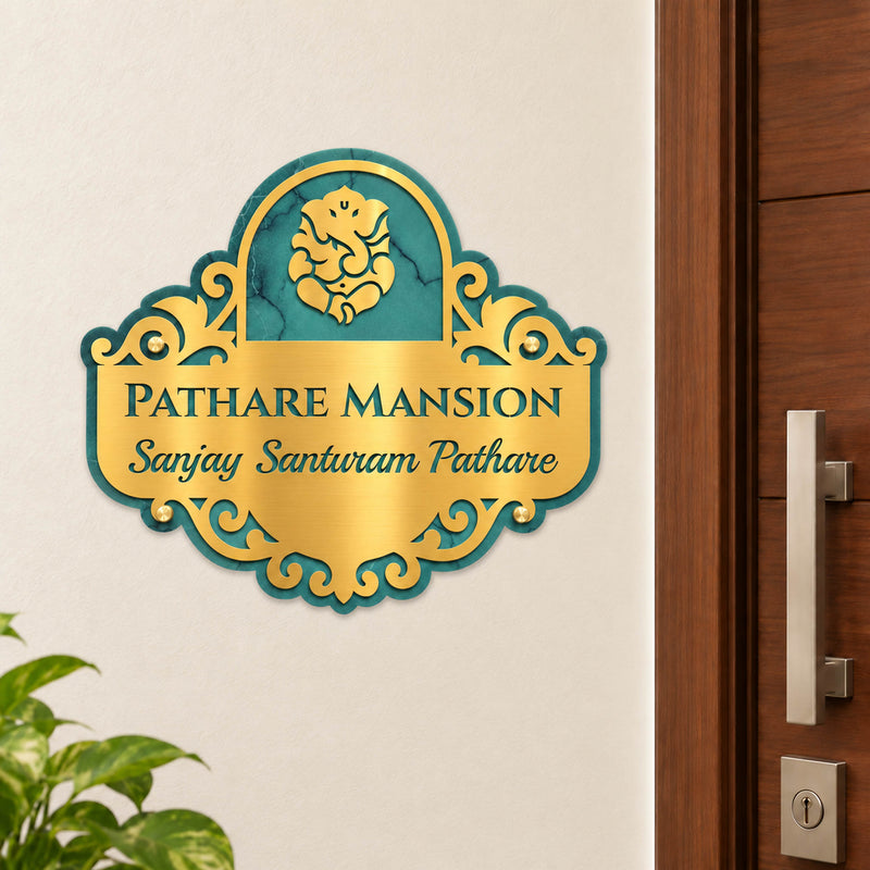 Pathare Mansion nameplate shown installed beside an indoor apartment entrance door