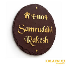 20 x 20 inch brown stone nameplate with mirror-gloss pure brass letters, E-1109, Samruddhi and Rakesh — Left angle studio view