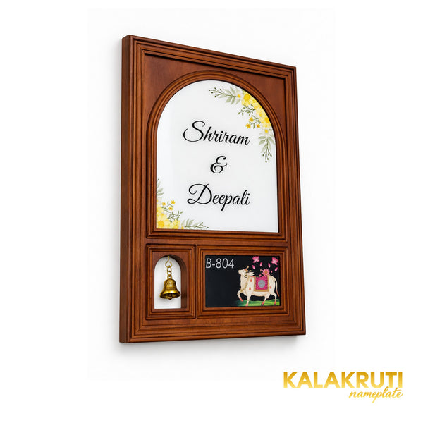 Left-end-nearer view of the Shriram and Deepali wooden nameplate, showing stepped moulding and approximately 1.25-inch total depth.